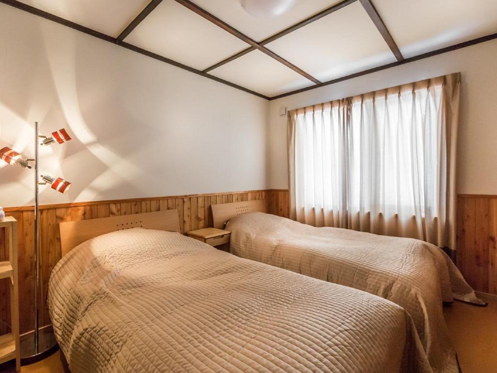 Matsu House With Air Conditioner - 5 Min To Rusutsu Ski Resort Русуцу Номер фото